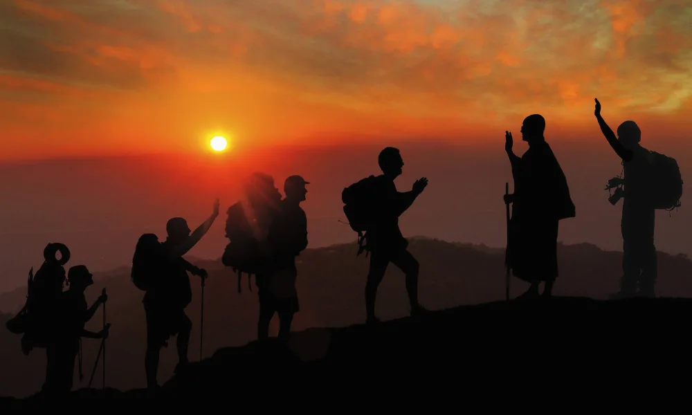 a group of people hiking on a mountain