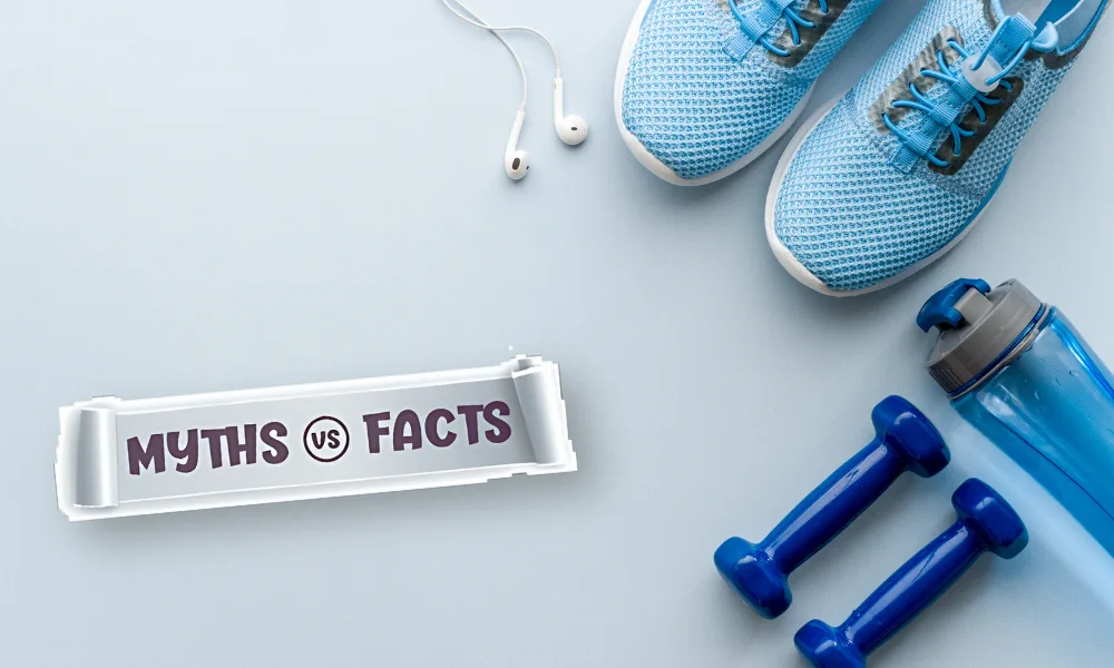 a pair of blue sneakers and dumbbells